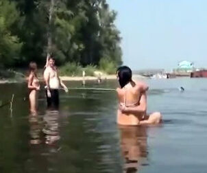 Bare youngsters on the beach for swingers in Kiev. Bare