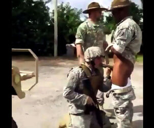 Soldier compelled to deepthroat dark-hued man meat