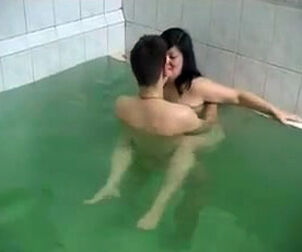 Youngster paramour and round wifey in the pool