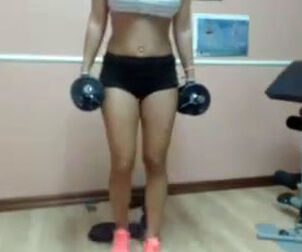 Pretty muscly damsel massaging puffies on cam in the gym